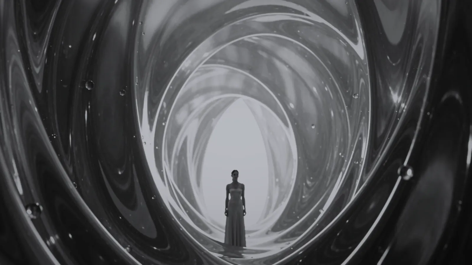 A black-and-white study of a receding geometric tunnel of light